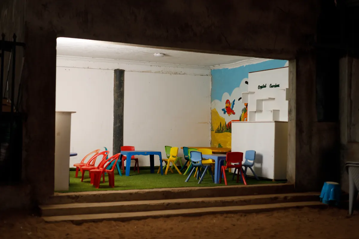 Indoor kids room with murals and seating