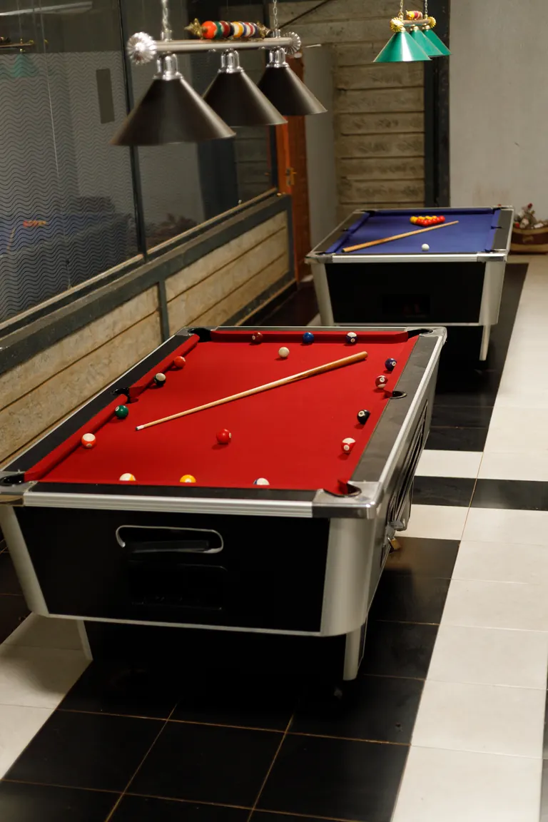 Both pool tables in the games room